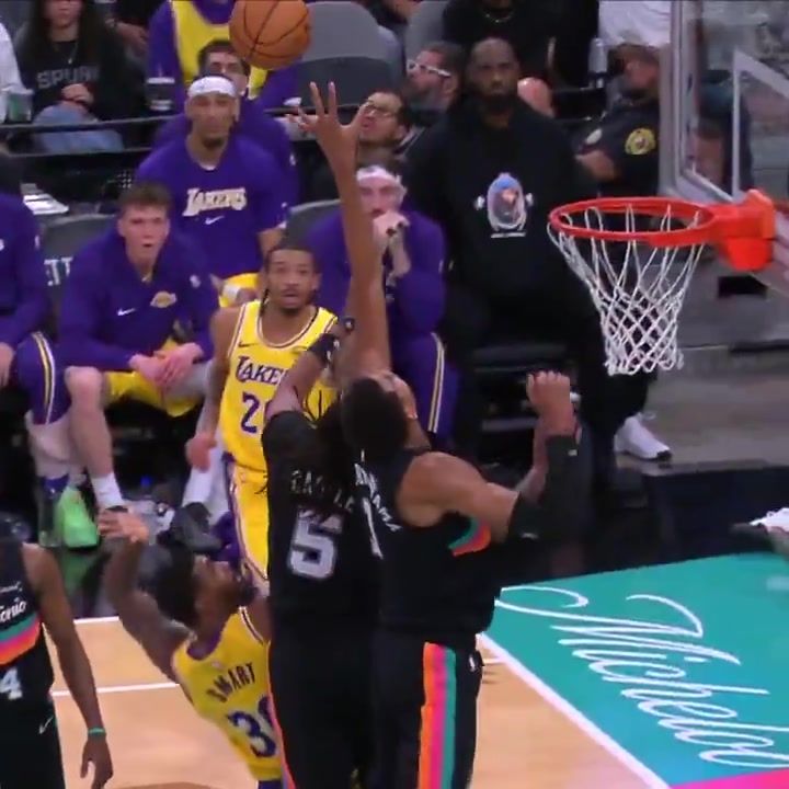 Wembanyama attempts a snatch block on Marcus smart
