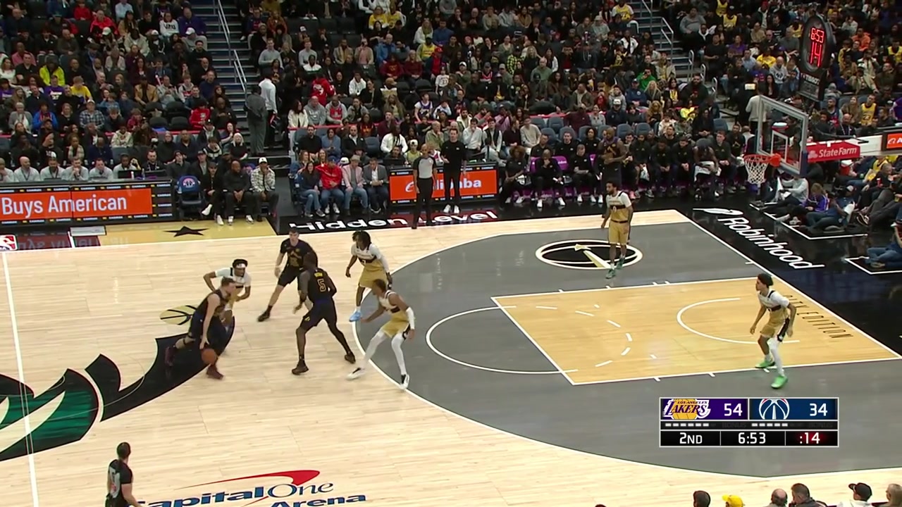 LeBron James with the lefty alley-oop dunk off a lob by Deandre Ayton with many replays