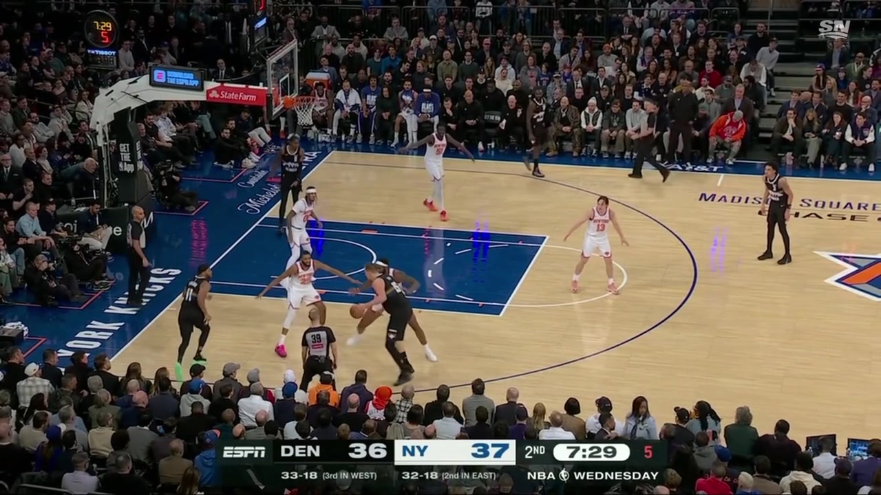 Mitchell Robinson blocks Nikola Joki's three-point attempt