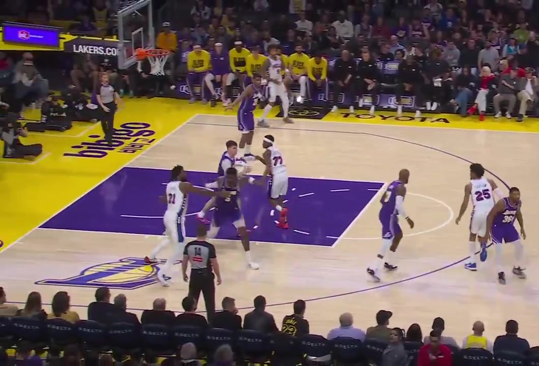 Ayton gets called for a foul as Embiid flops and falls