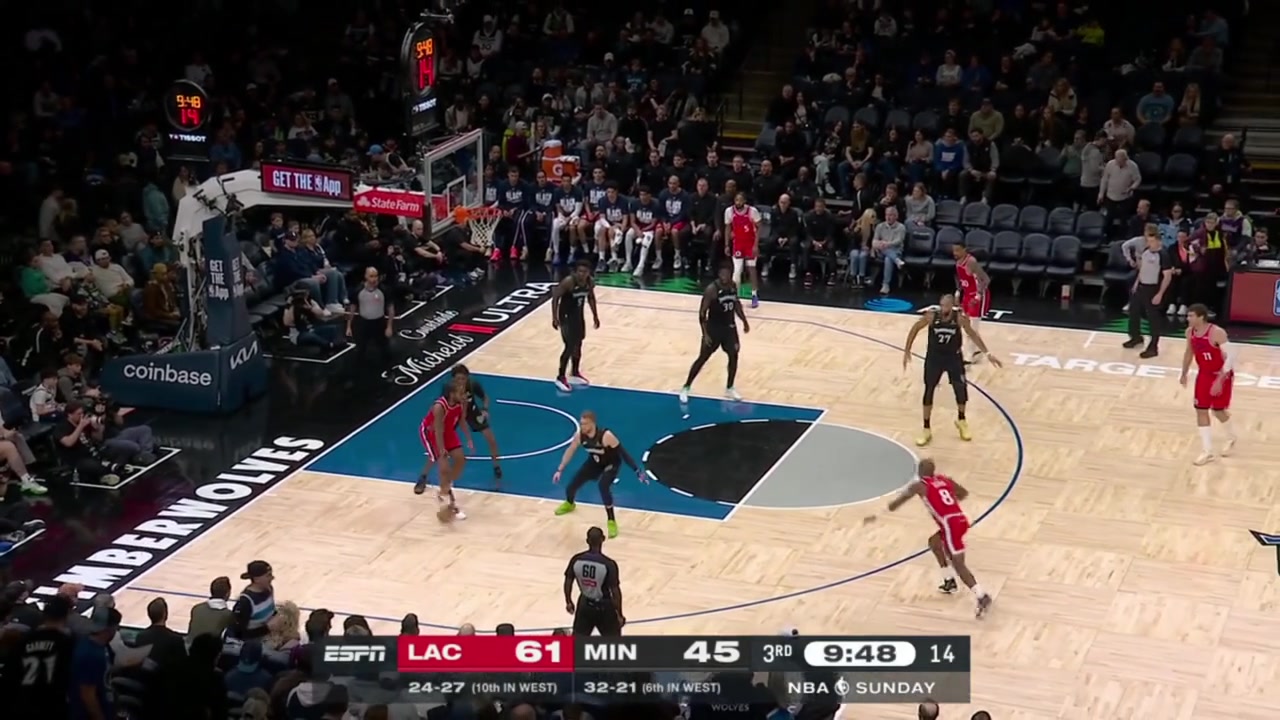Kawhi Leonard backs down his defender in the post steps through the double team and gets it off the glass and in