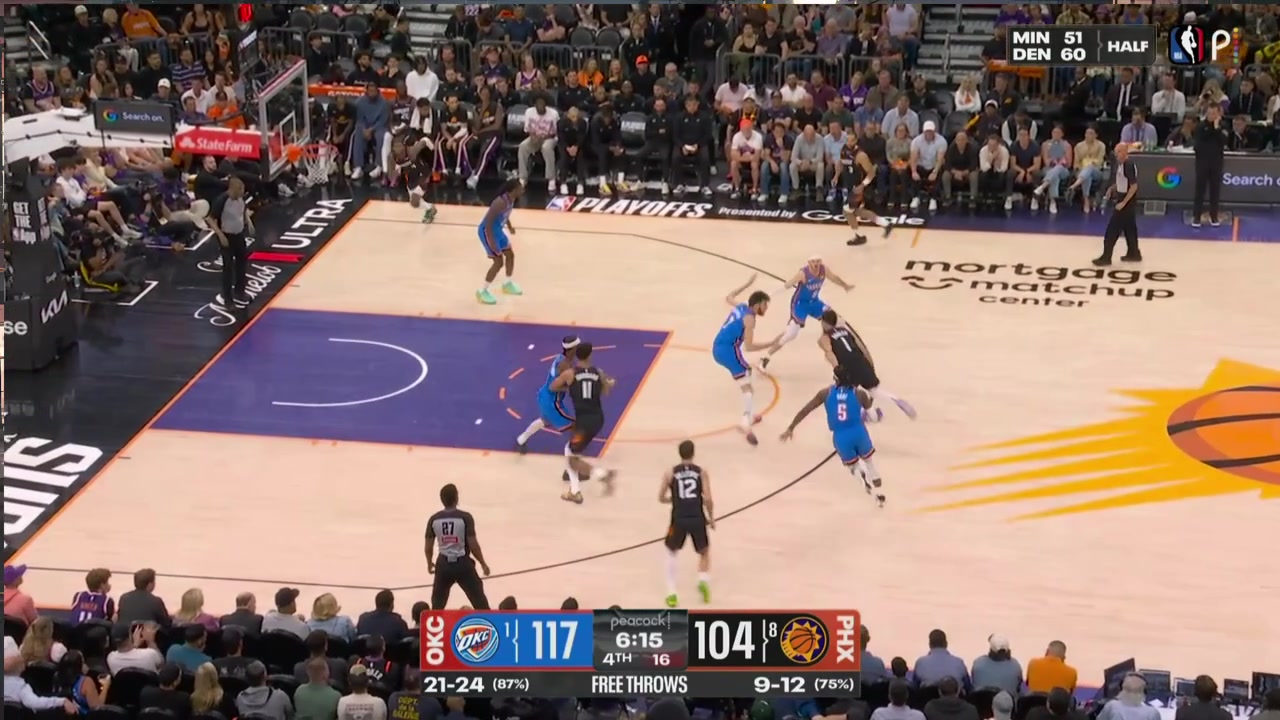 Devin Booker draws the defensive foul on Chet Holmgren
