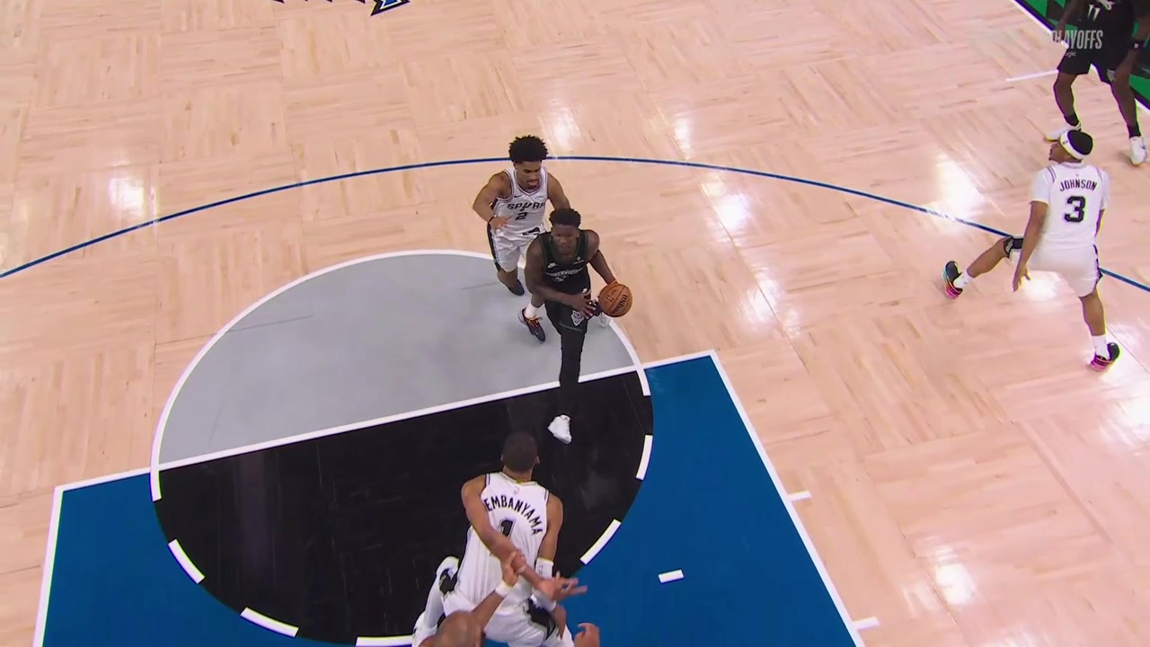 Wemby blocks Ant while Gobert is holding his arm then Ant prevents him from reaching the loose ball
