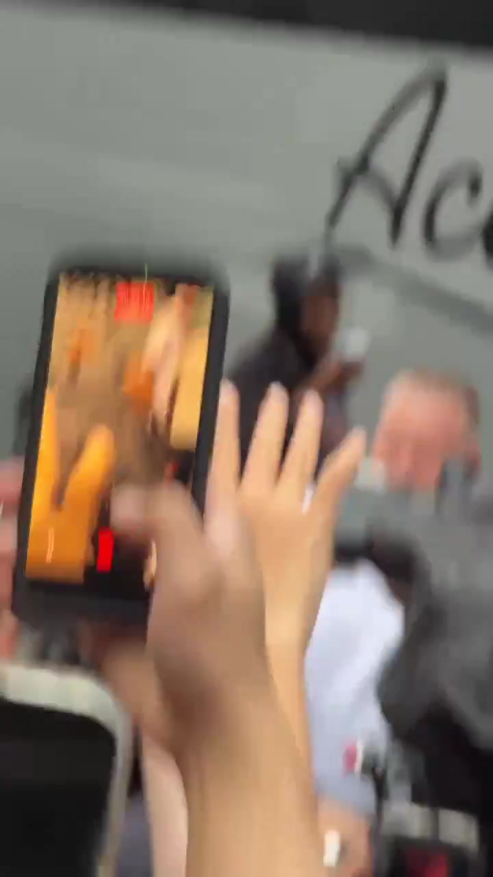 Mike Brown starts a Who Let the Dogs Out chant wearing a 10 Weeks Shirsey