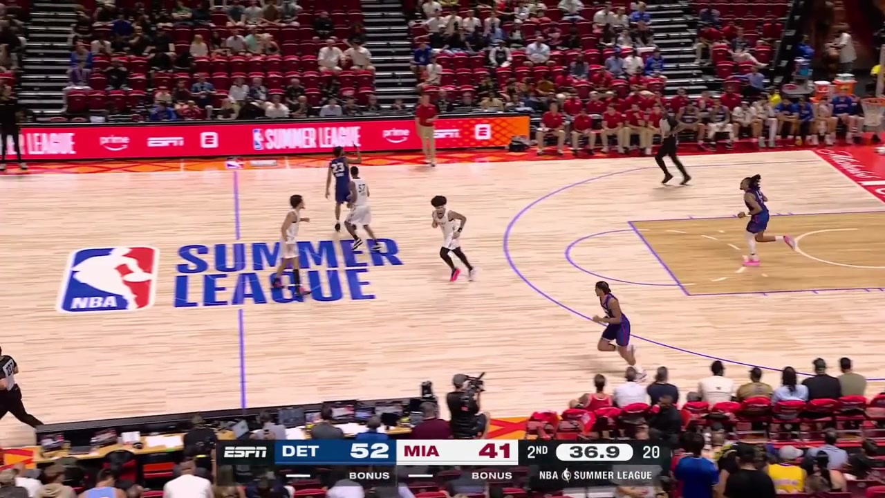 Vladislav Goldin denies the two-handed dunk attempt by Isaac Jones and gets called for the foul on his second attempt to block Jones with a replay