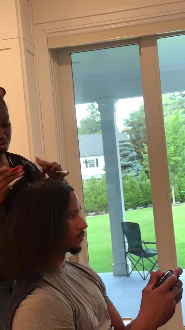 Josh Hart gets his braids done by Tropix Braids