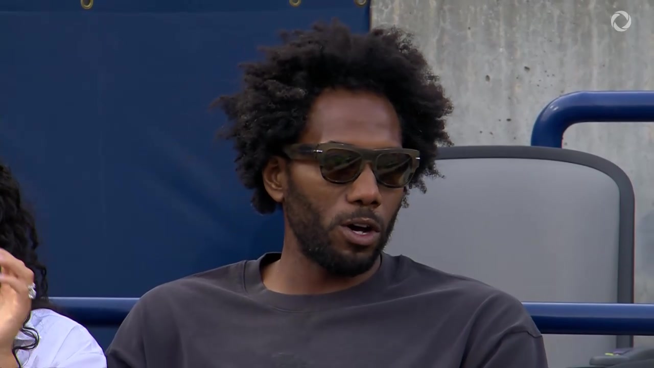 'The Fun Guy' Kawhi Leonard makes his way to watch the womens quarterfinal at the National Bank Open in Toronto