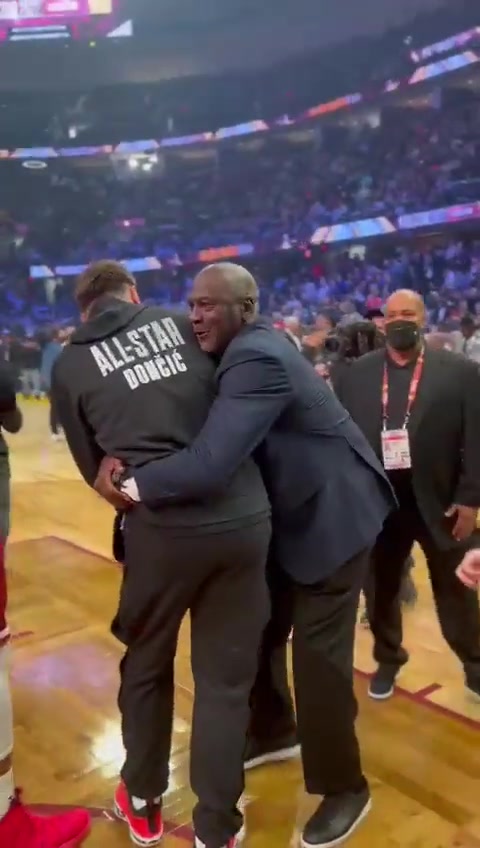 MJ hugs Luka from behind at the 2022 NBA All-Star game