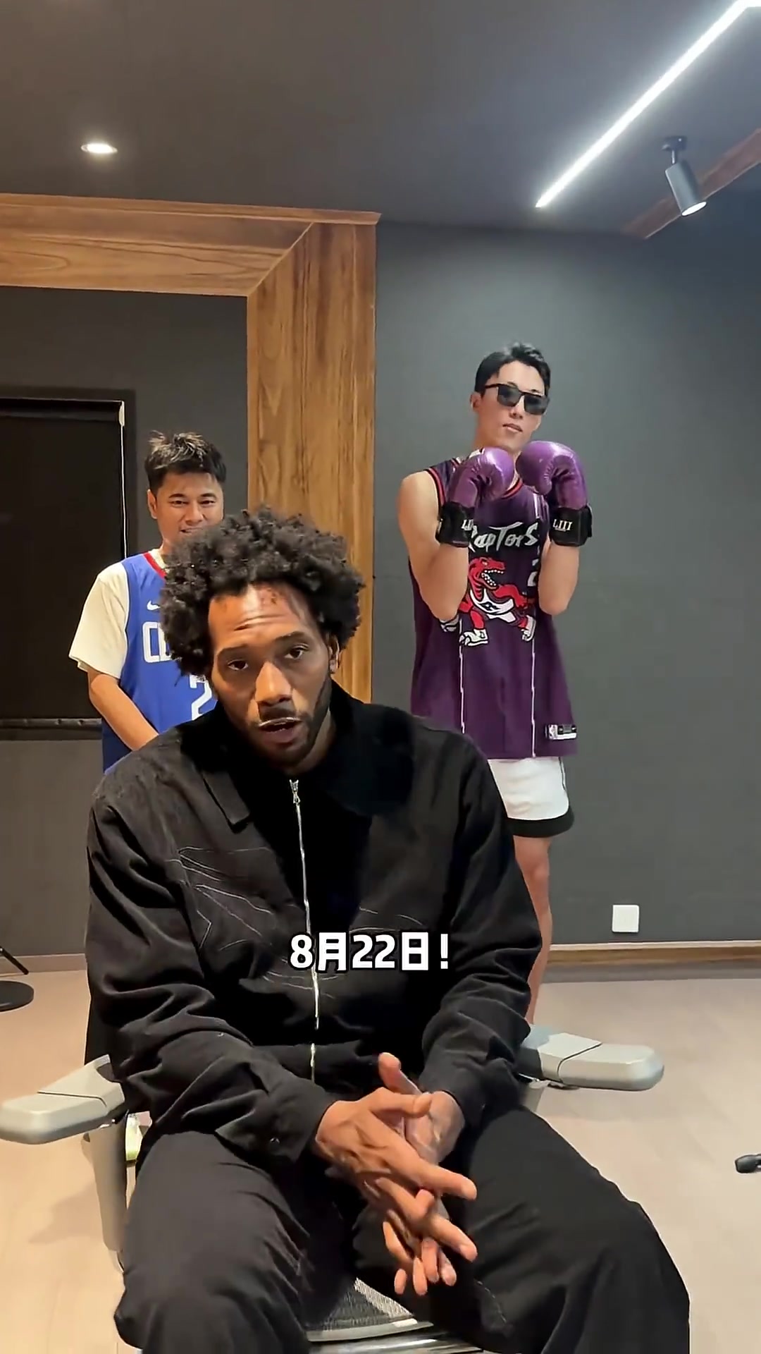 Kawhi Leonard promotes an appearance in China with a Raptors and Clippers jersey behind him August 22 see me in Wuhan