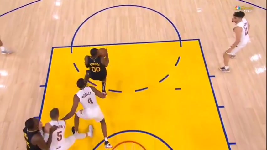 Evan Mobley is called for a shooting foul which is somehow overturned after the challenge