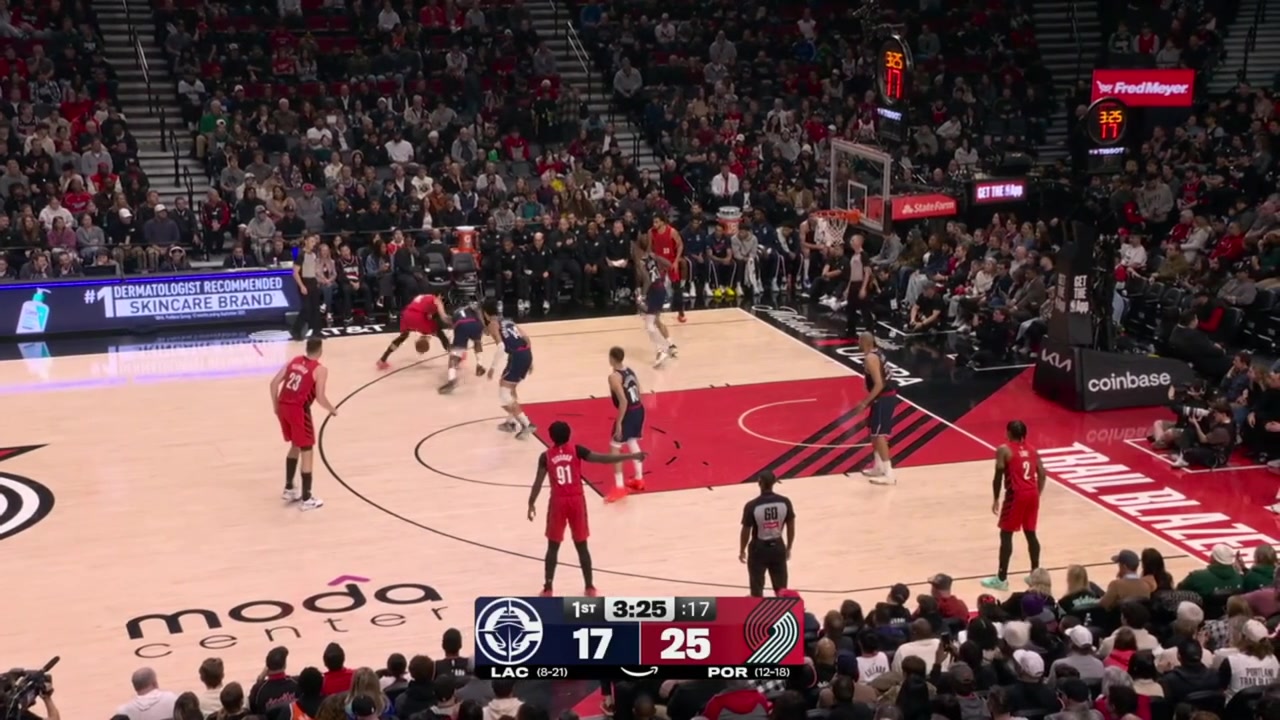 Deni Avdija finishes the tough layup despite heavy contact from Yanic Konan Niederhuser with replays