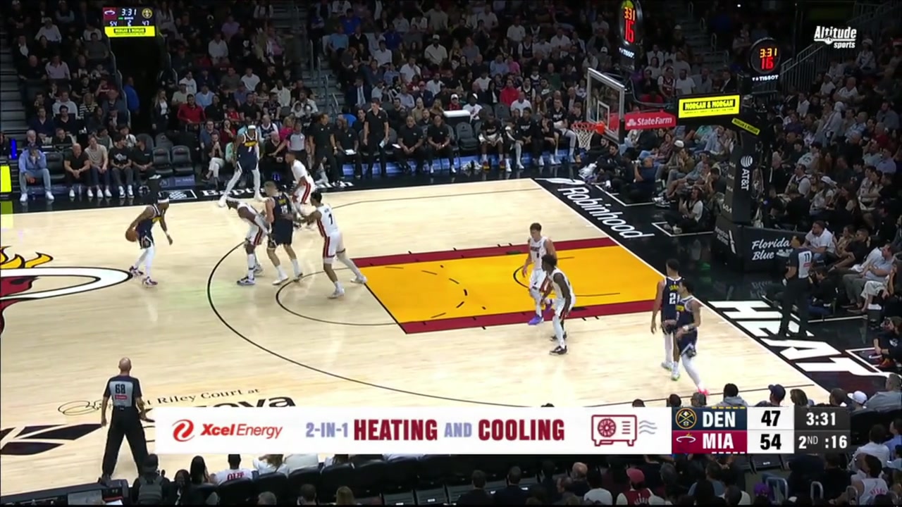 Joki threads a behind-the-back pass to a cutting Bruce Brown for two