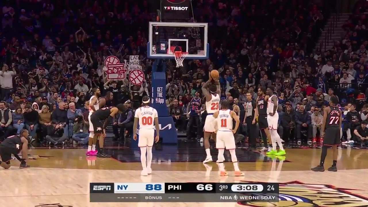 Mitchell Robinson makes sure to break the 76ers fans hearts and keep them hungry - NO chicken He then smiles
