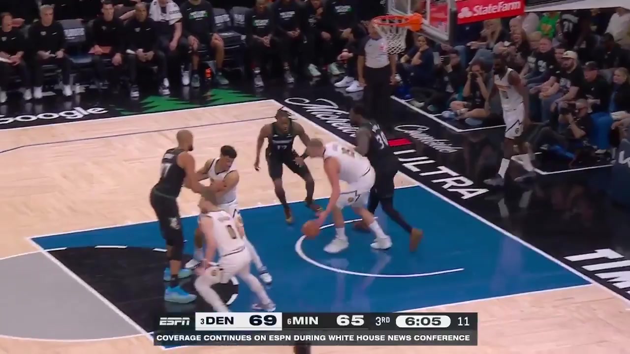 Nikola Jokic intercepts Goberts pass and is fouled by Julius Randle