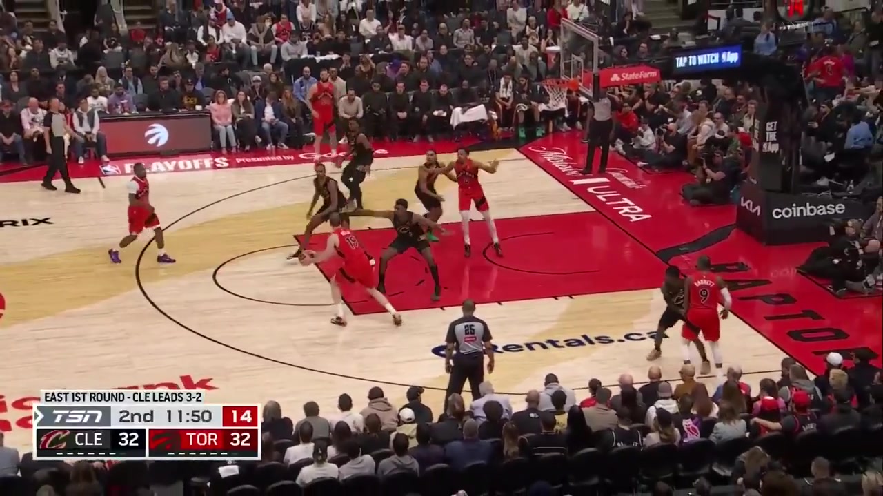 Scottie Barnes gets the shot up over two defenders and a bit of contact