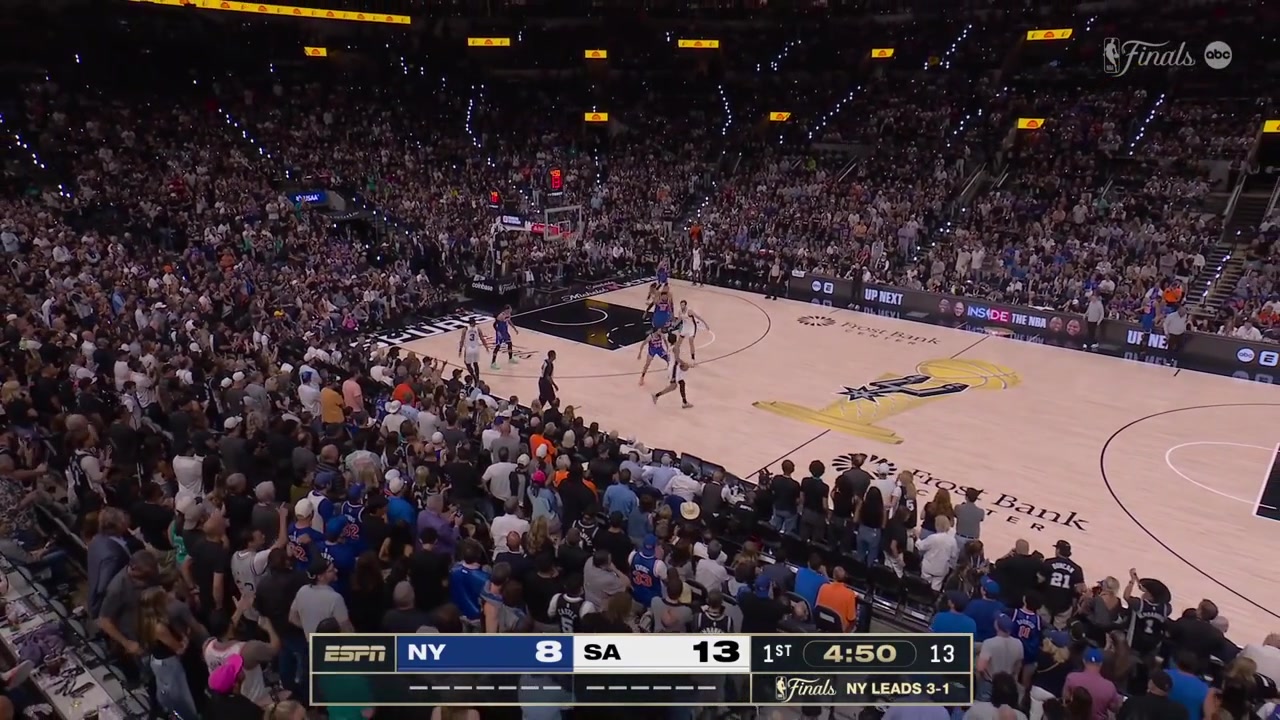 Dylan Harper banks in the tough reverse layup and then holds his left wrist with a replay