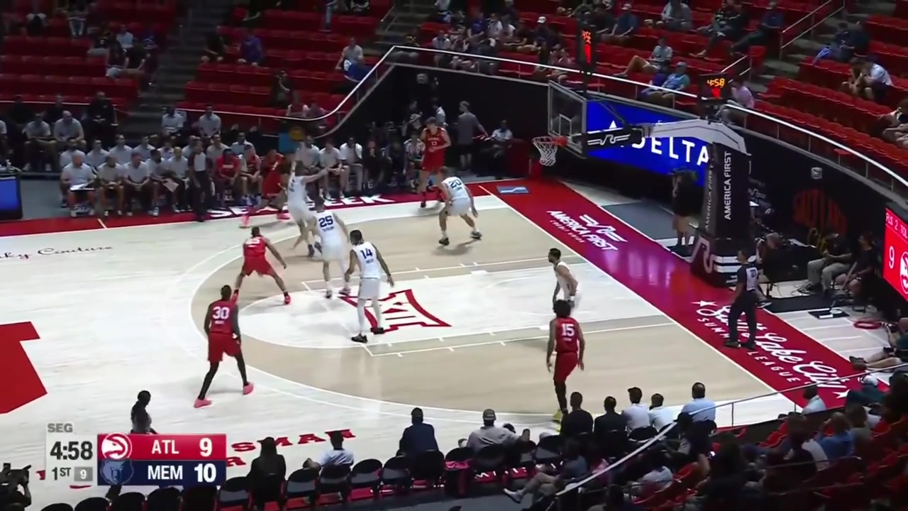 Jacob Toppin banks in the circus lefty And-1 shot with a replay