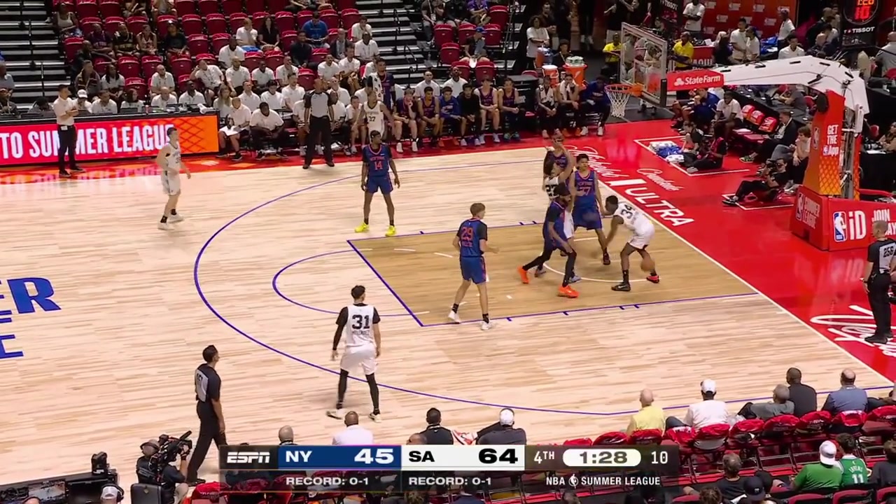 Langston Wilson blocks Tyon Grant-Foster and Jack Kayil with the two-handed dunk at the other end