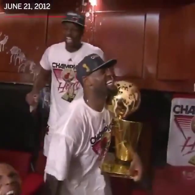Chris Bosh celebrates his first NBA championship by dousing himself in champagne 2012