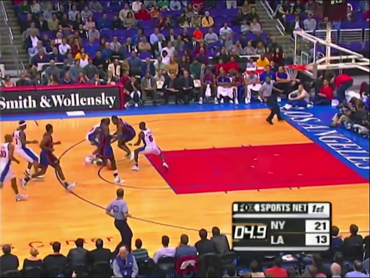 Latrell Sprewell makes a jumper while sitting down