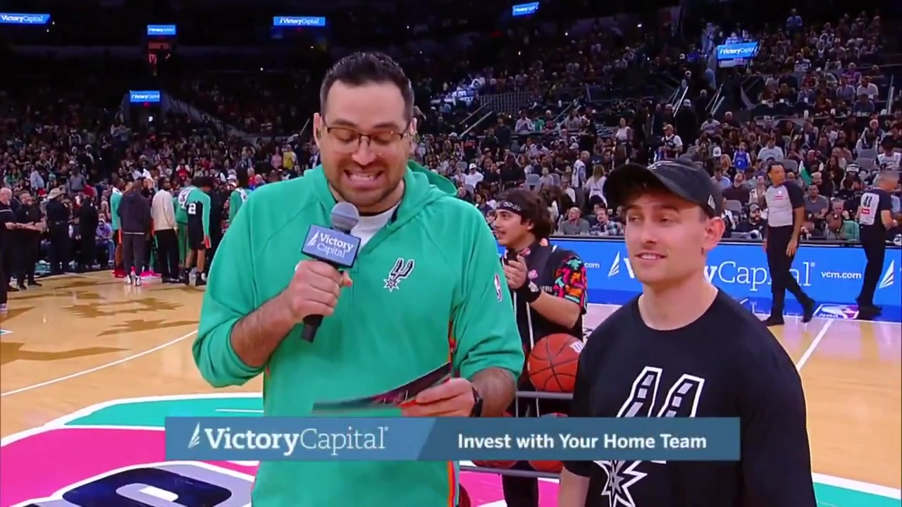 A Spurs fan hits a layup a 3 from the perimeter and a halfcourt shot in under 45 seconds to win 10K dollars with replays