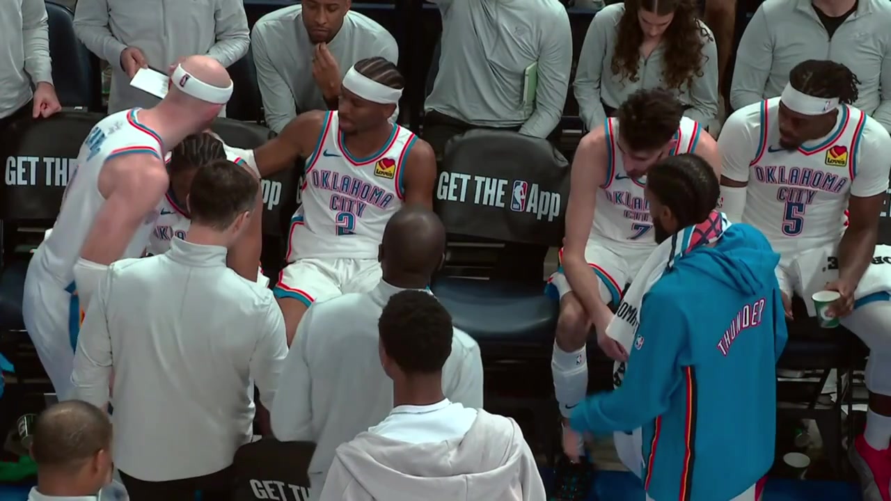 Shai Gilgeous-Alexander puts his hand on Jalen Williams' shoulder during a timeout move him back and forth talking to him with 418 minutes remaining in the 4th quarter
