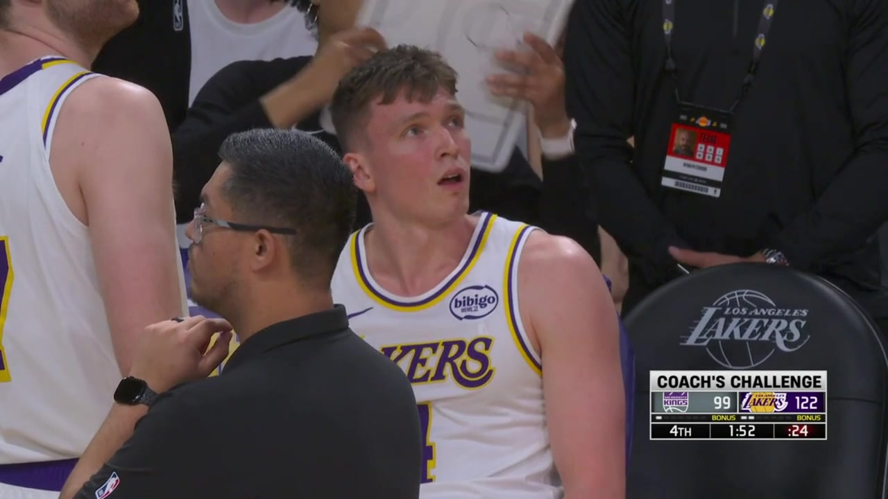 Russell Westbrook having some words with a Lakers fan and the security escort the fan out