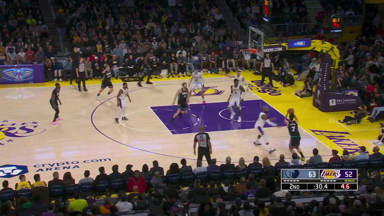 LeBron James intercepts the pass spin in the air while receiving a pass from Deandre Ayton and finds Jake LaRavia for the dunk with a replay