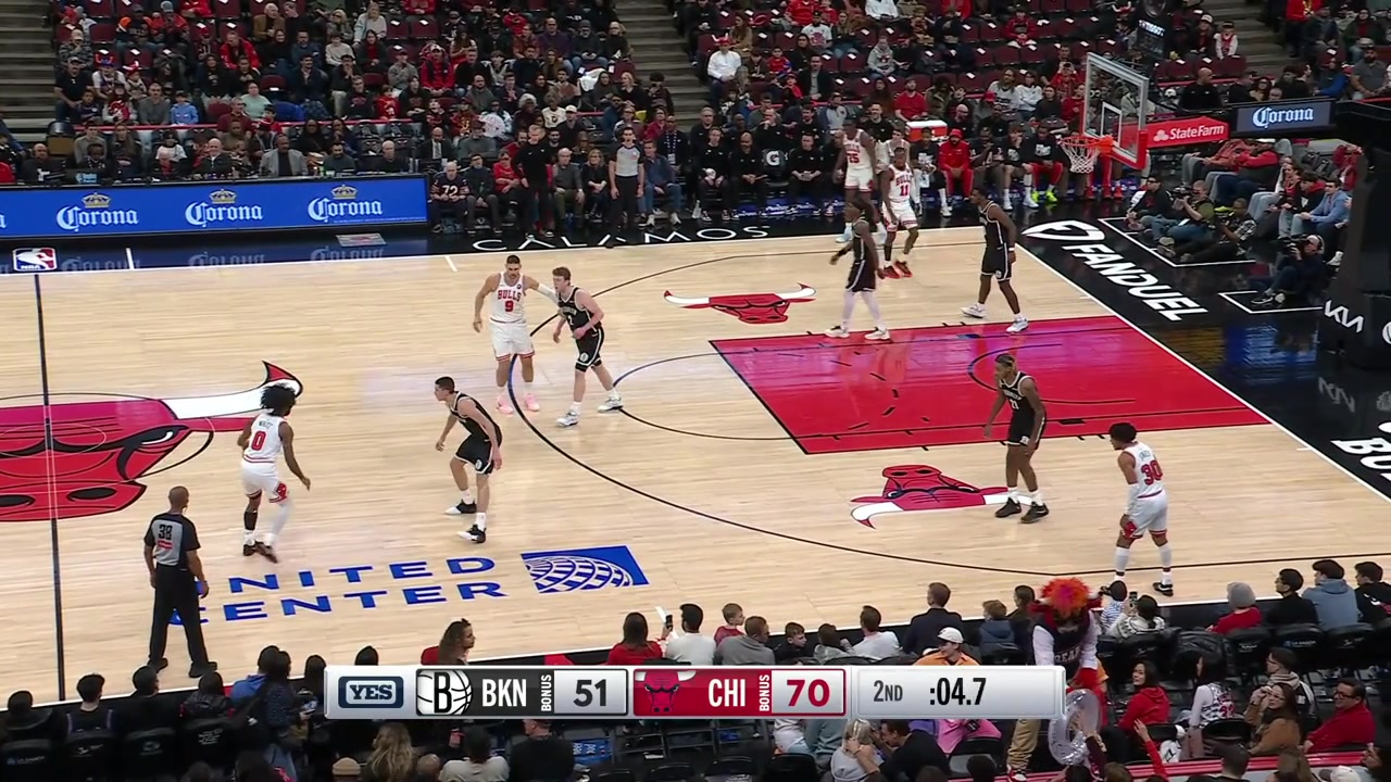 Danny Wolf gets the steal and makes the halfcourt shot but it was after the buzzer with a replay