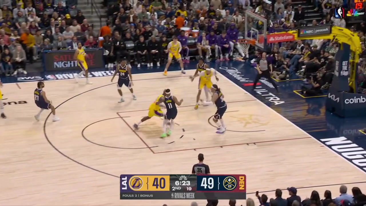 LeBron James drives down the lane and throws down a powerful slam