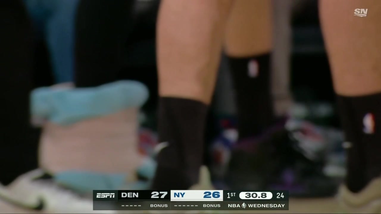 Karl-Anthony Towns still bleeding returns to the court to knock down both free throws to cheers from the Knicks crowd then heads to the bench to be patched up