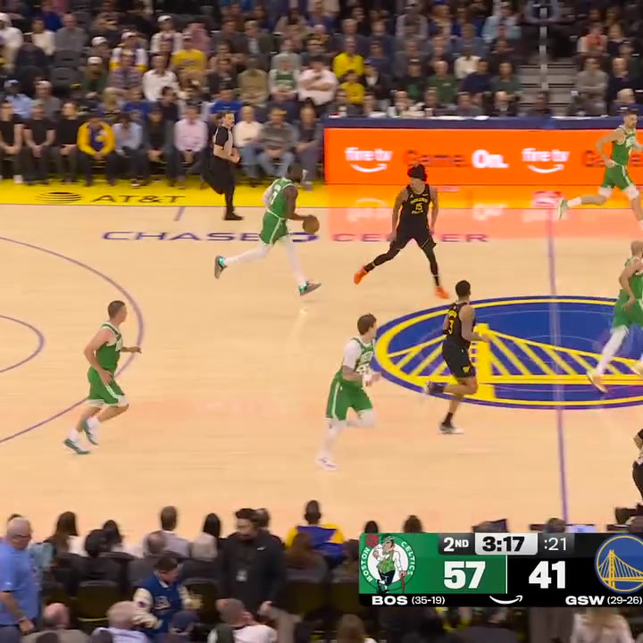 Jaylen Brown slips through the defense for an and one