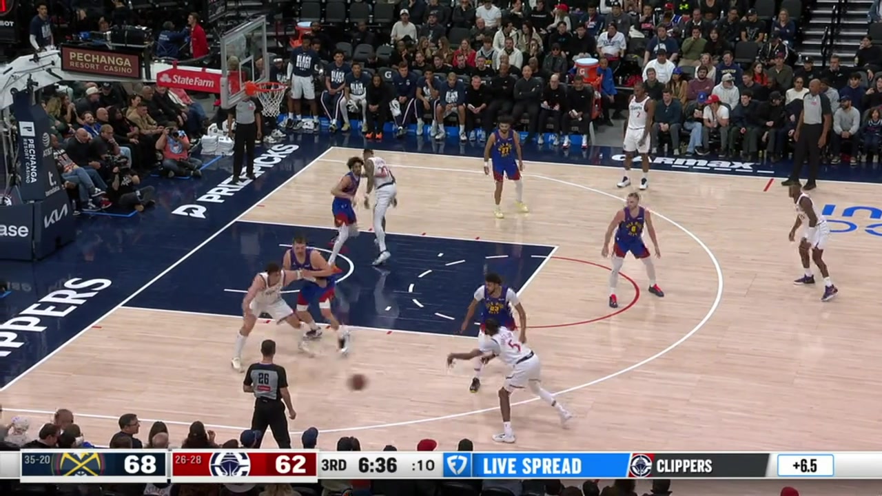 Brook Lopez posts up Nikola Jokic spins and finishes the reverse layup with a replay