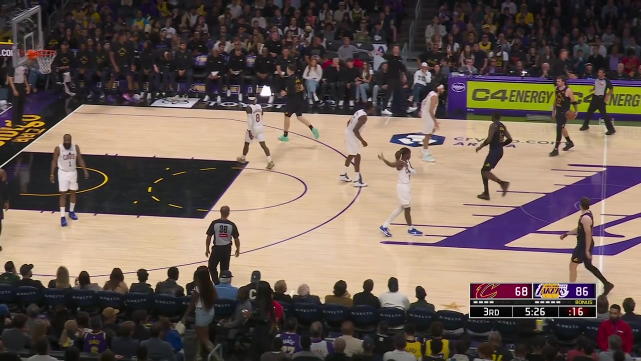 Luka Doncic hits the deep 3-pointer over Max Strus and then the assist to Austin Reaves for the 3-pointer with replays