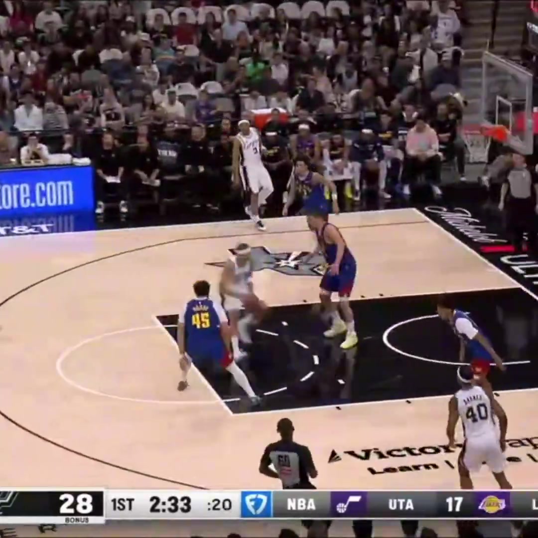 Carter Bryant dunks on Jokic