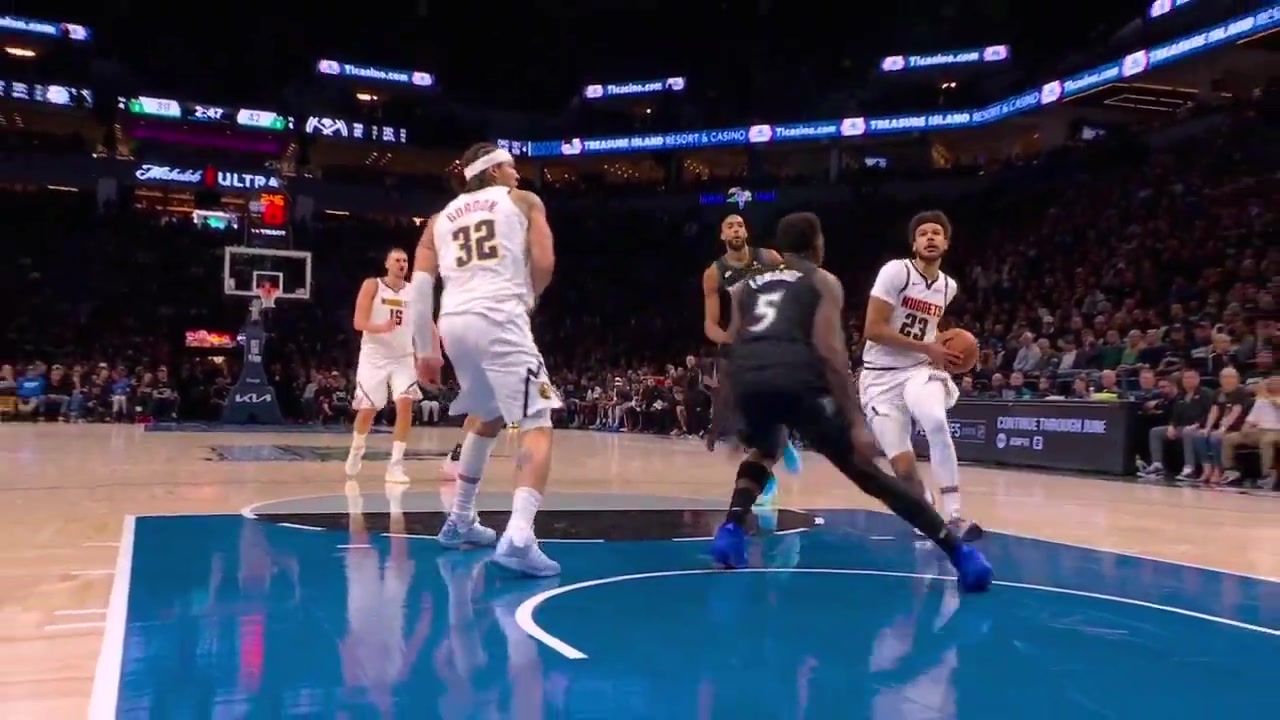 Injury Slow motion replay shows Anthony Edwards hyperextending his knee