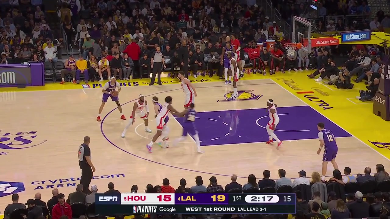 Austin Reaves goes around the Rockets defense and scores the lefty layup with a replay
