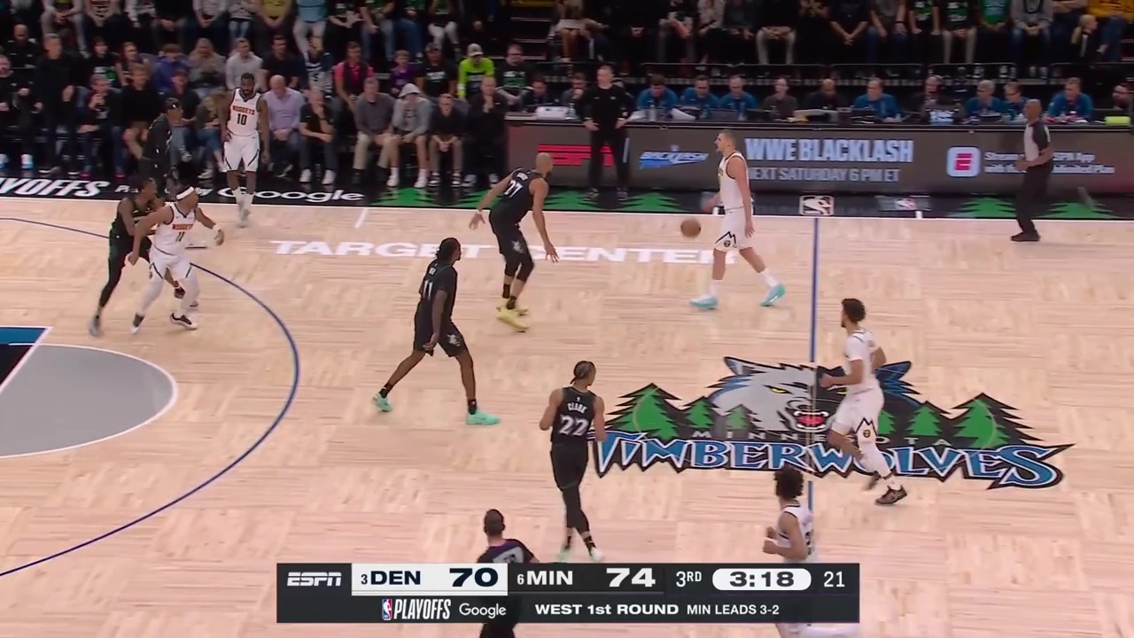 Nikola Jokic drives and scores the layup despite the pressure by Rudy Gobert23 Points for Jokic