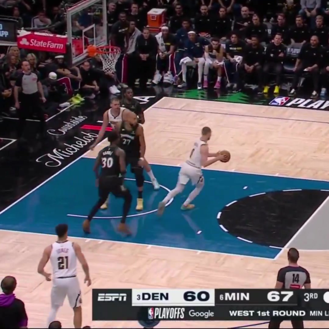 Christian Braun runs away in the paint
