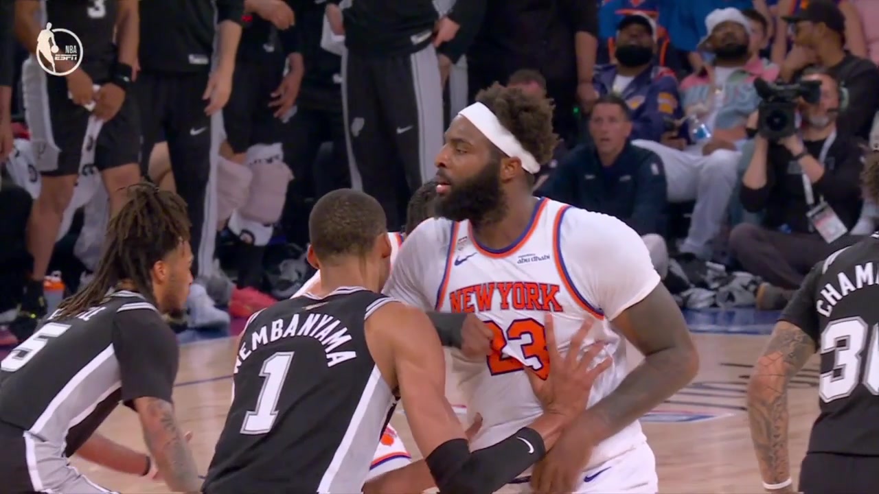 Wemby taunts after taking a hit from Mitch Robinson flagrant 1 on review