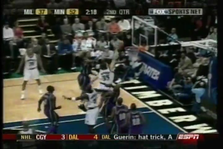 Mark Madsen with the powerful dunk vs the Milwaukee Bucks on his Minnesota Timberwolves debut on the first game of the season October 29th 2003