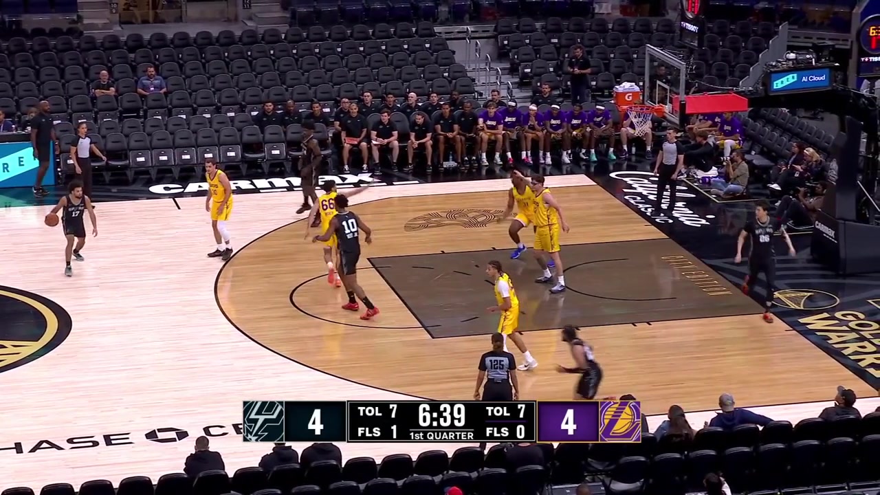 Hyunjung Lee pump fakes drives and kicks the ball out to Emanuel Miller for the corner 3