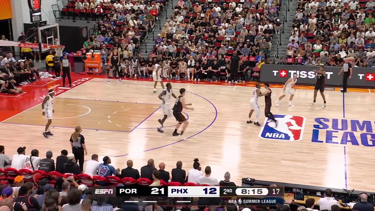 Yang Hansen goes around Khaman Maluach for the powerful left-handed dunk with a replay