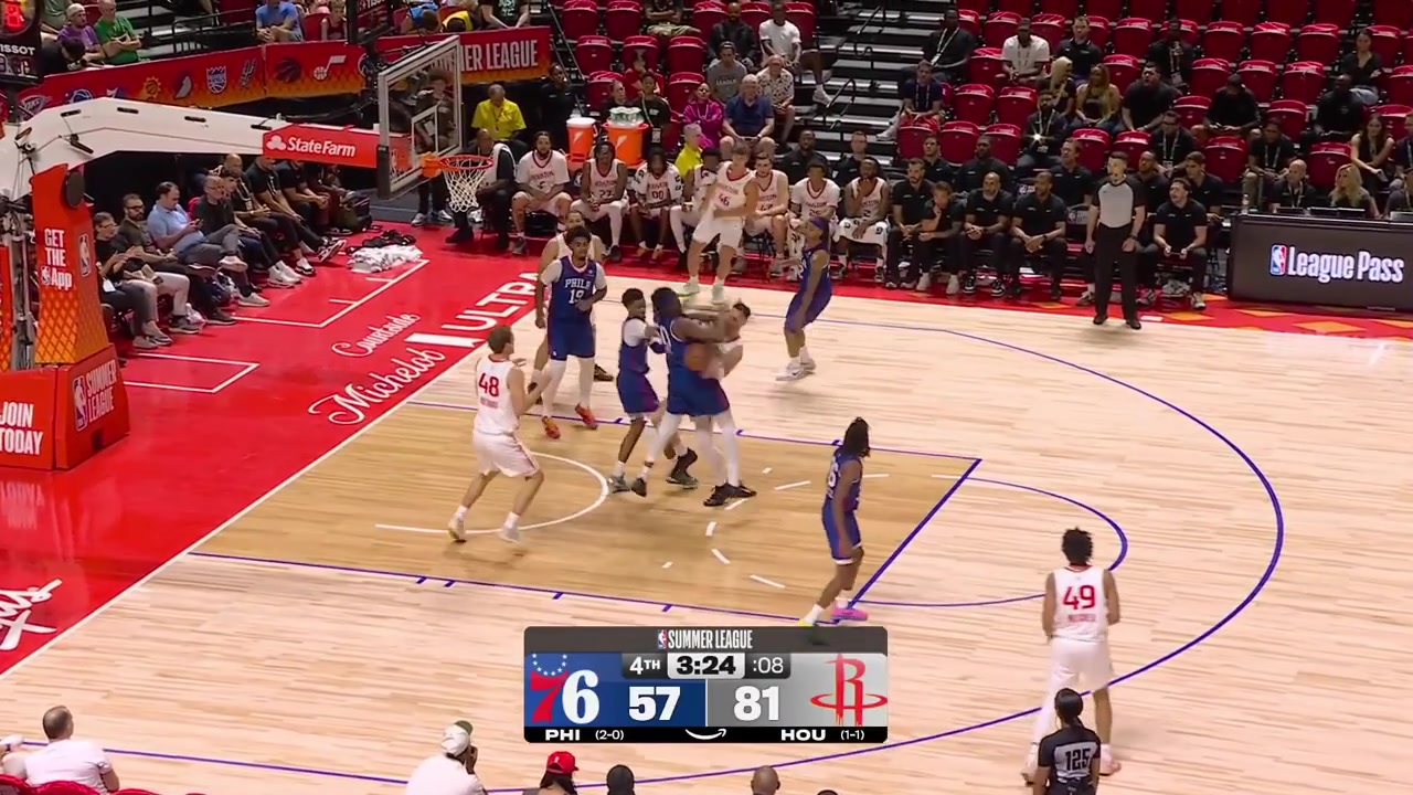 Chris Ledlum grabs the offensive rebound and scores the layup while surrounded by 3 Sixers