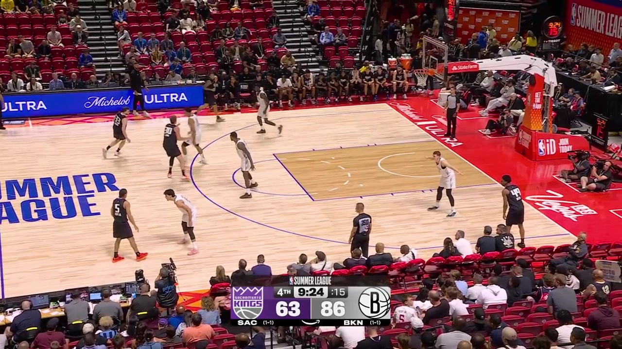 Darius Acuff Jr drives through the Nets' defense and scores the tough bucket on Ben Saraf
