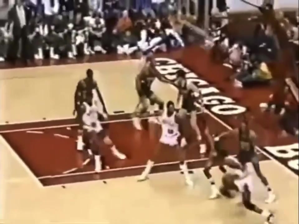 The opposing players are baffled as fouls get called just for making contact with Michael Jordan