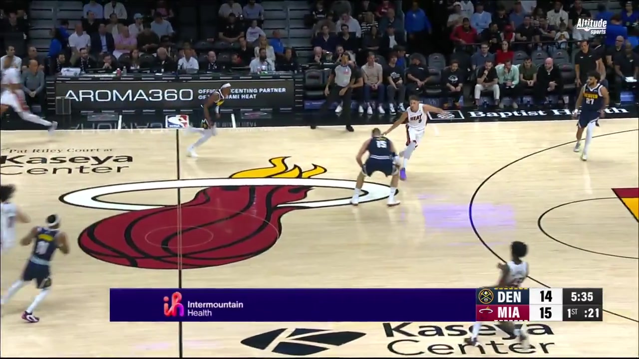 Nikola Jokic with an athletic alley oop