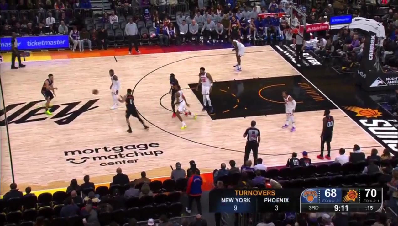 Booker splits two defenders before putting OG on a poster