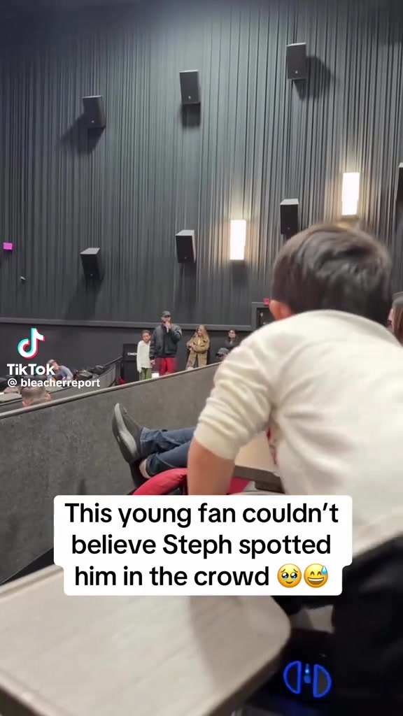 Stephen Curry spots a young fan in the crowd