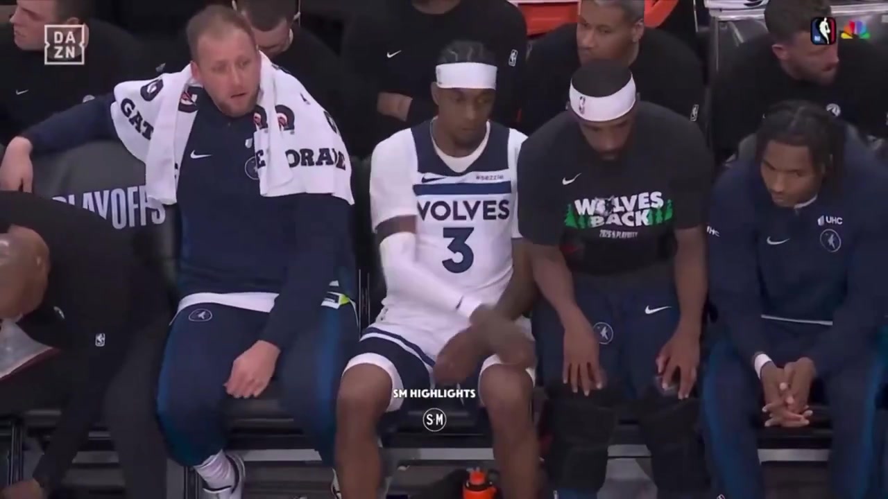 Jaden Mcdaniels throwing a towel back on the bench